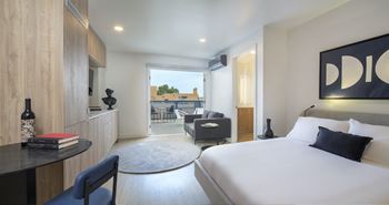 Furnished bedroom suite with private outdoor terrace